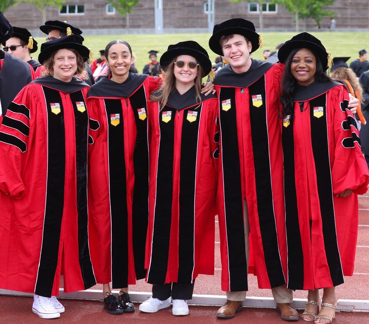 Five students on graduation day